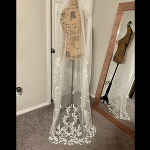 Floor length ivory veil